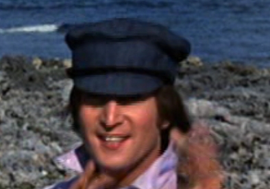 Lennon on Help set wearing one of many caps